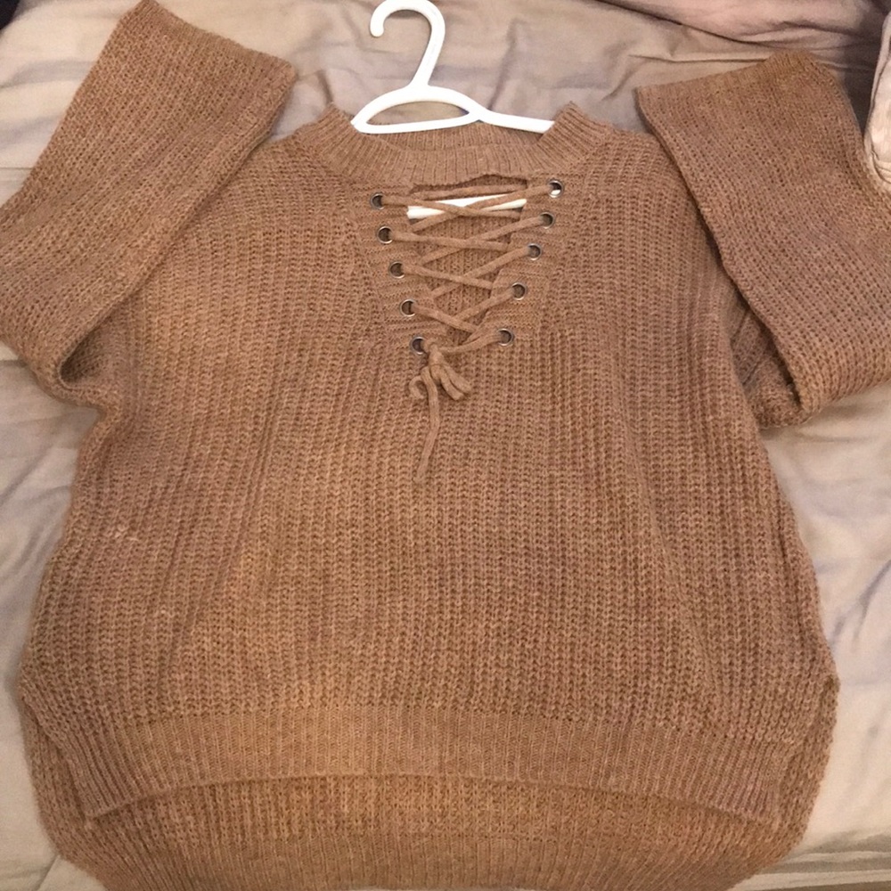 Never worn before, brown sweater